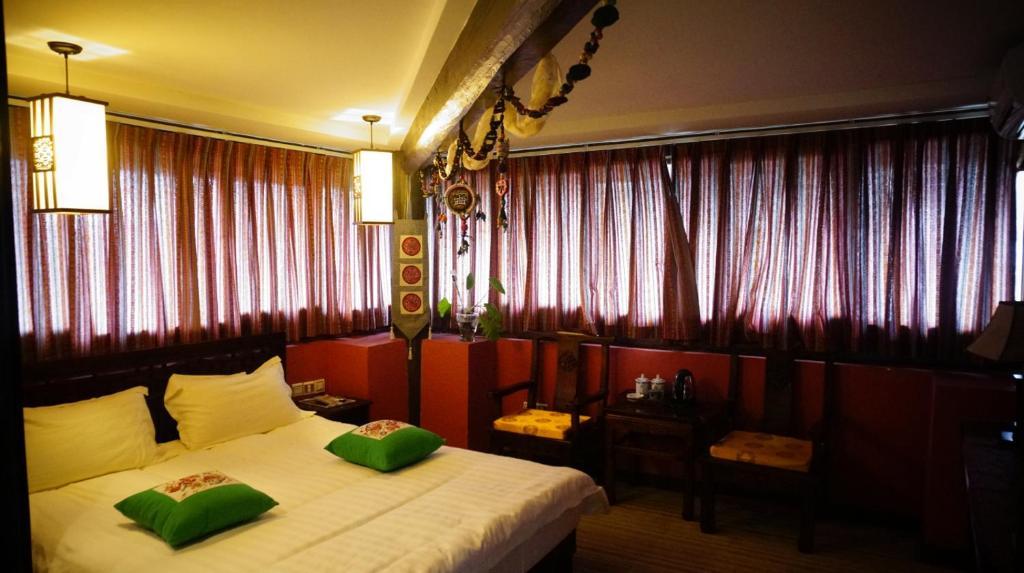 Lijiang Wangjia Courtyard Inn Phòng bức ảnh